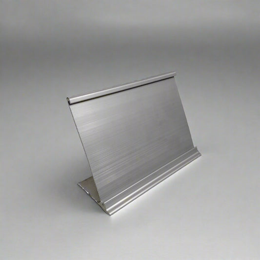 Sleek aluminum price tag stand with a clear product label.