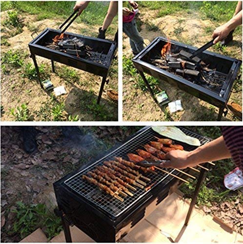 Portable briefcase-style charcoal BBQ grill and tandoor with folding stand for outdoor cooking.