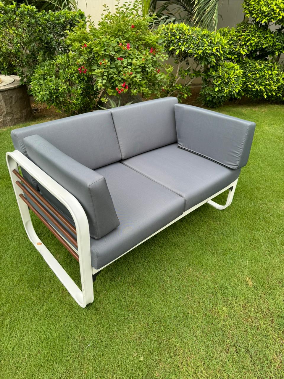 Stylish Nautilus 2 Seater Aluminum Outdoor Patio Sofa featuring a durable aluminum frame and plush, weather-resistant cushions, perfect for outdoor relaxation