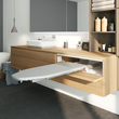 Foldable pull-out ironing board mounted inside a drawer