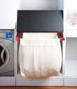 Pull-out laundry basket with aluminum worktop extension