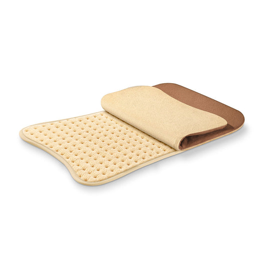 Beurer HK 115 Cosy Heat Pad with extra-soft surface, fast heating, and adjustable temperature settings for comfort and relaxation.