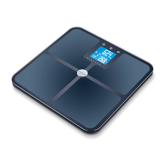 Beurer BF 950 Diagnostic Bathroom Scale with Wi-Fi and Bluetooth® connectivity, displaying body composition data on an illuminated LCD screen.