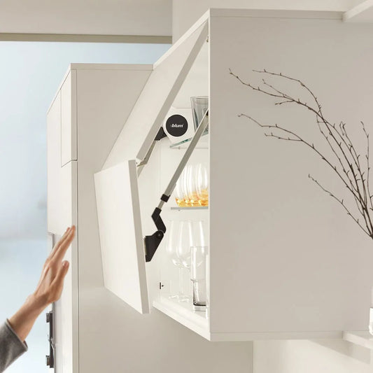 Aventos HF lift system by Blum for large and heavy bi-fold cabinet doors, featuring effortless opening and closing, adjustable design, and sleek modern aesthetics. Ideal for enhancing cabinet functionality and accessibility.