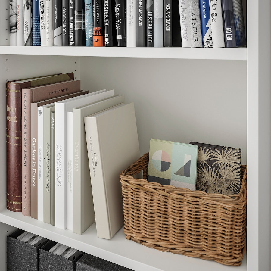 A modern white bookcase with 4 tiers, measuring 23 5/8x55 1/8 inches. Ideal for displaying books and decorative items, it combines style and functionality, enhancing any home or office space