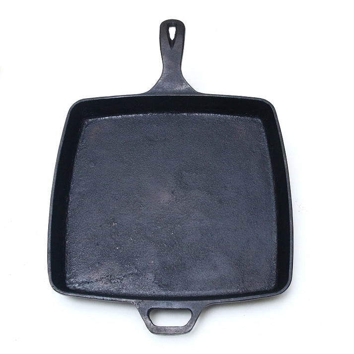 11-inch square cast iron skillet, pre-seasoned for versatile cooking with shallow sidewalls for better containment.