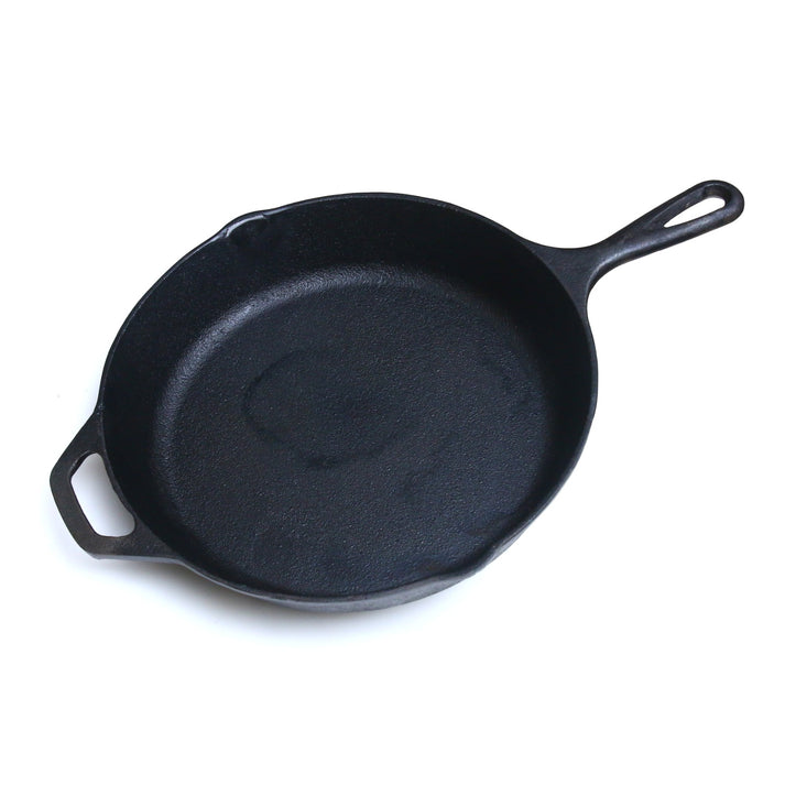 Seasoned 10-inch cast iron skillet for versatile, chemical-free cooking on various heat sources.