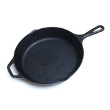 Seasoned 10-inch cast iron skillet for versatile, chemical-free cooking on various heat sources.