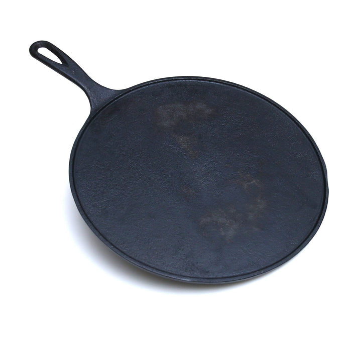 12-inch cast iron Tawa, naturally non-stick, perfect for cooking rotis, parathas, dosas, and more.