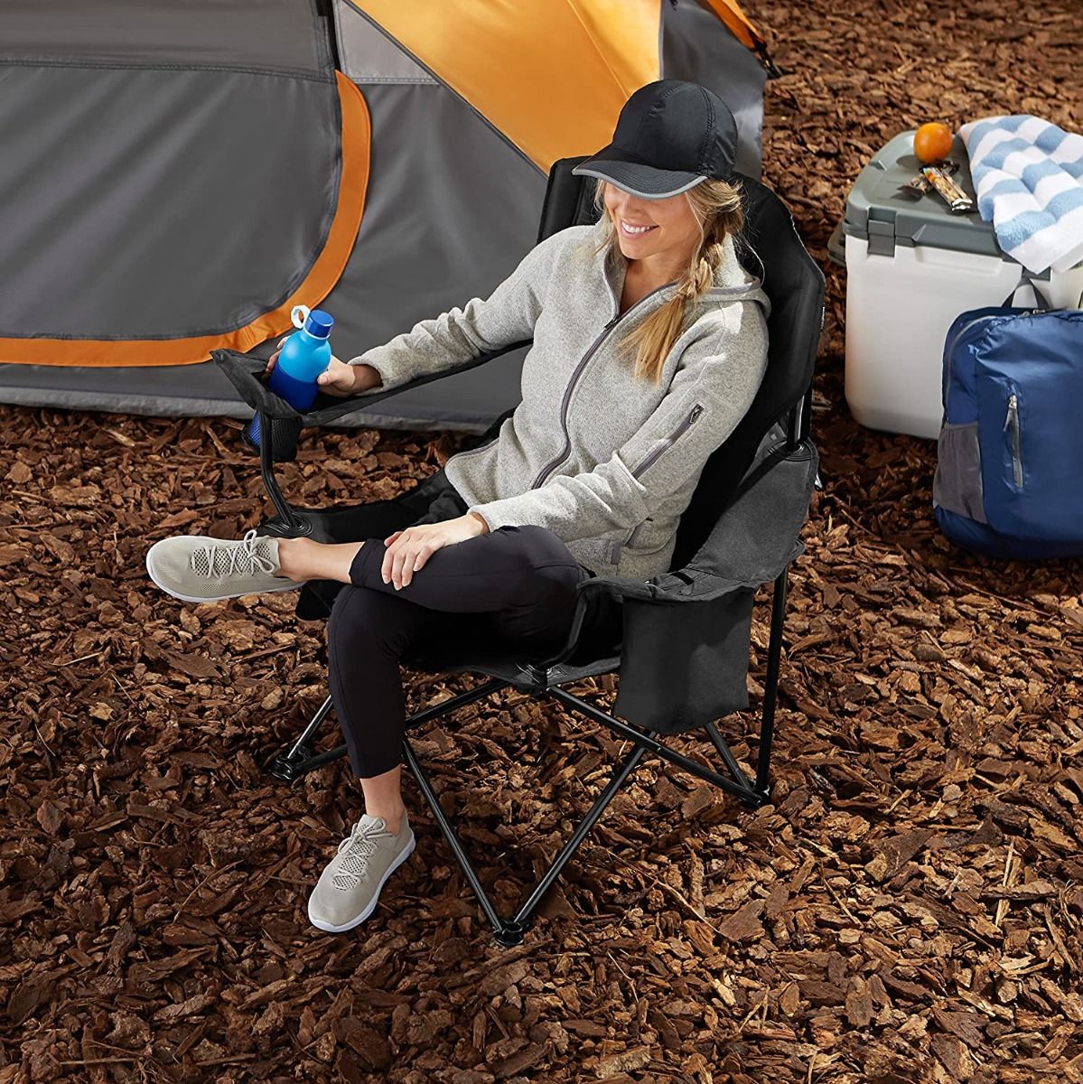 Coleman Quad Chair with built-in cooler, cushioned seat, adjustable arms, and storage pockets for outdoor comfort and convenience