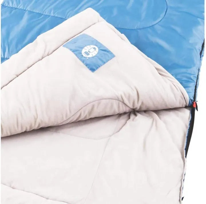 Lightweight Coleman Sun Ridge 40°F Warm Weather Sleeping Bag designed for comfort in warm weather camping, with soft liner and durable insulation.