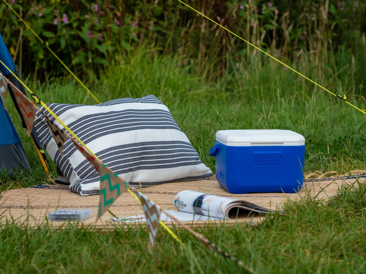 Compact Coleman 5 Quart Performance Cooler with hinged lid, holds 6 cans for daily outdoor adventures.