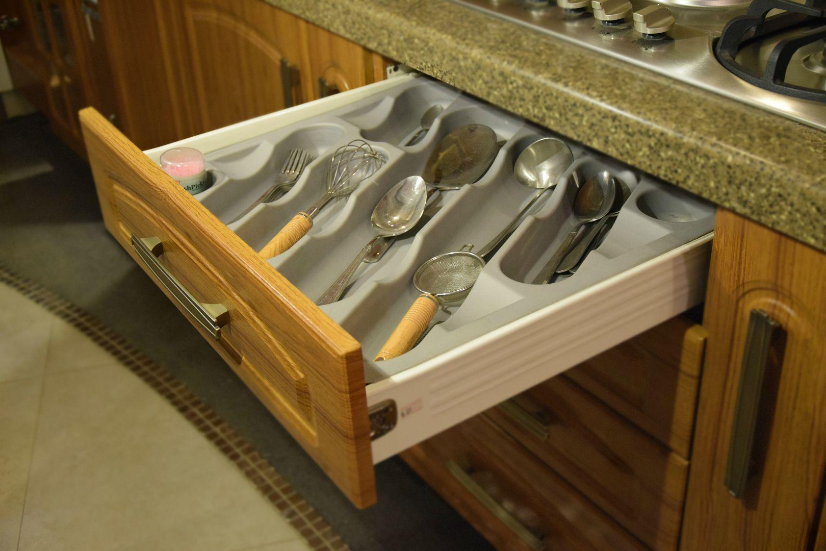 Medium PVC cutlery tray with multiple compartments for organizing spoons, forks, knives, and other utensils. Dimensions: H 1.75" x W 21" x D 19", perfect for kitchen drawer storage