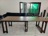 Extendable dining table with aluminum legs and MDF top, adjustable from 36 inches to 8 feet.