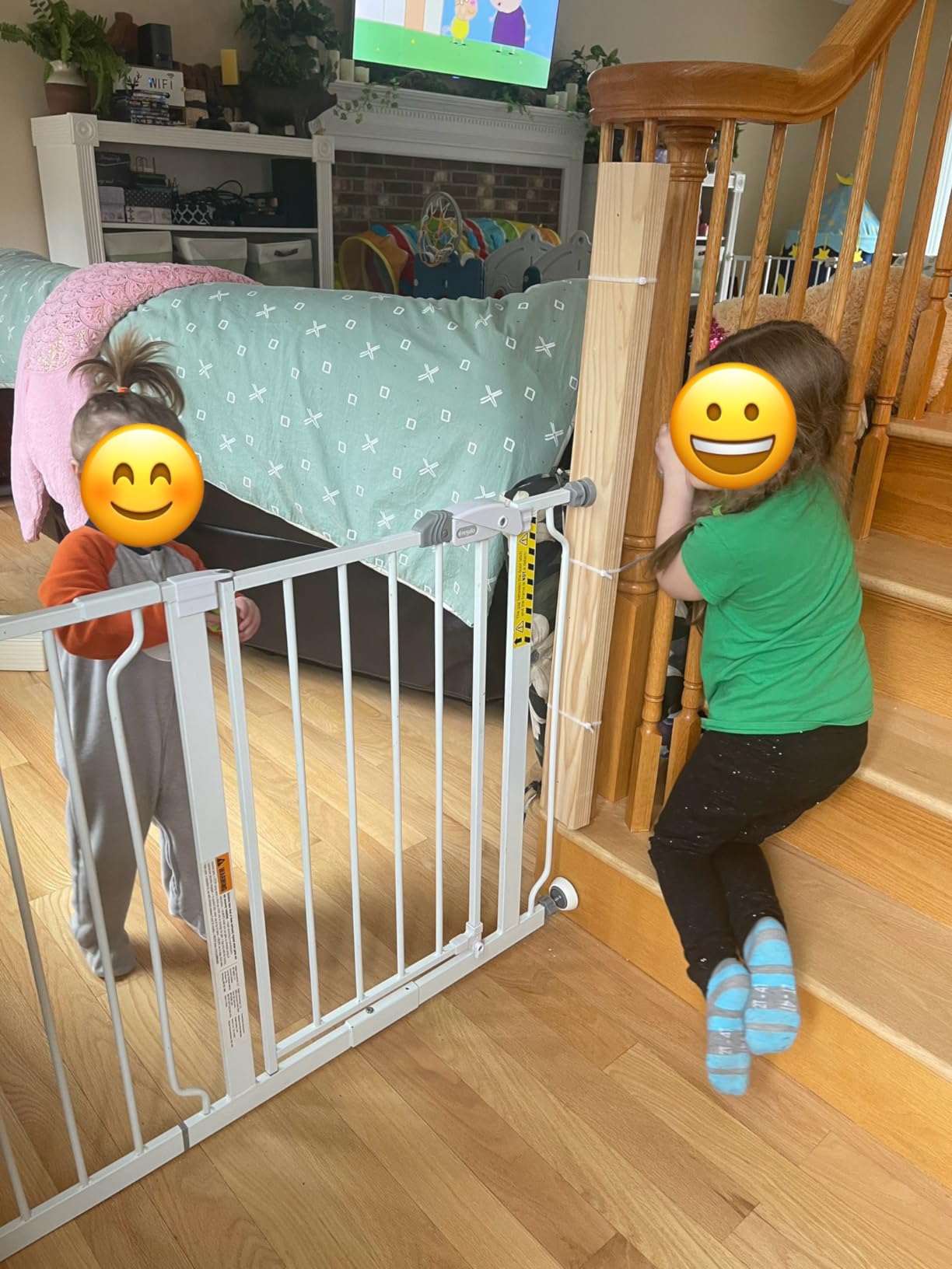 Adjustable baby gate installed in a doorway to keep the baby safe