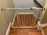 Pressure-mounted baby gate with a latch for easy adult access