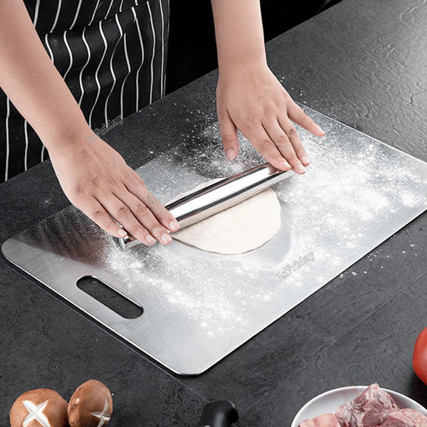 Stainless steel chopping board (33cm x 22cm), made from 100% food-grade, eco-friendly material. Features rounded edges and anti-skid pads for safety. Durable, easy to clean, and knife-friendly, perfect for chopping vegetables, fruits, and meats. Made to order, ready in 15 days.