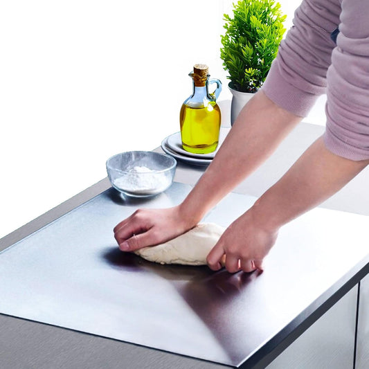 Large stainless steel chopping and cutting board (35.5cm x 33cm, 1mm thick), designed for heavy-duty use. Multipurpose, easy to clean, and features a non-slip base for stability. Ideal for cutting vegetables, meat, and fruits. Sleek, modern, and hygienic