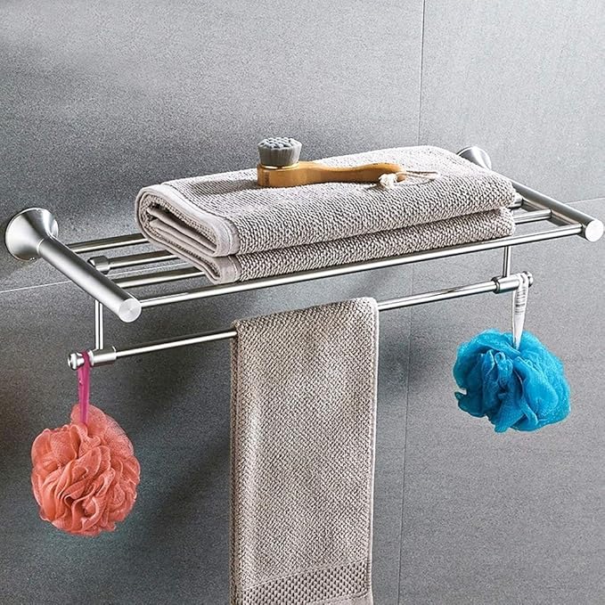 Stainless steel wall-mounted towel storage shelf.