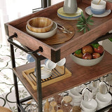 Versatile chef's cart with storage shelves and sturdy wheels.