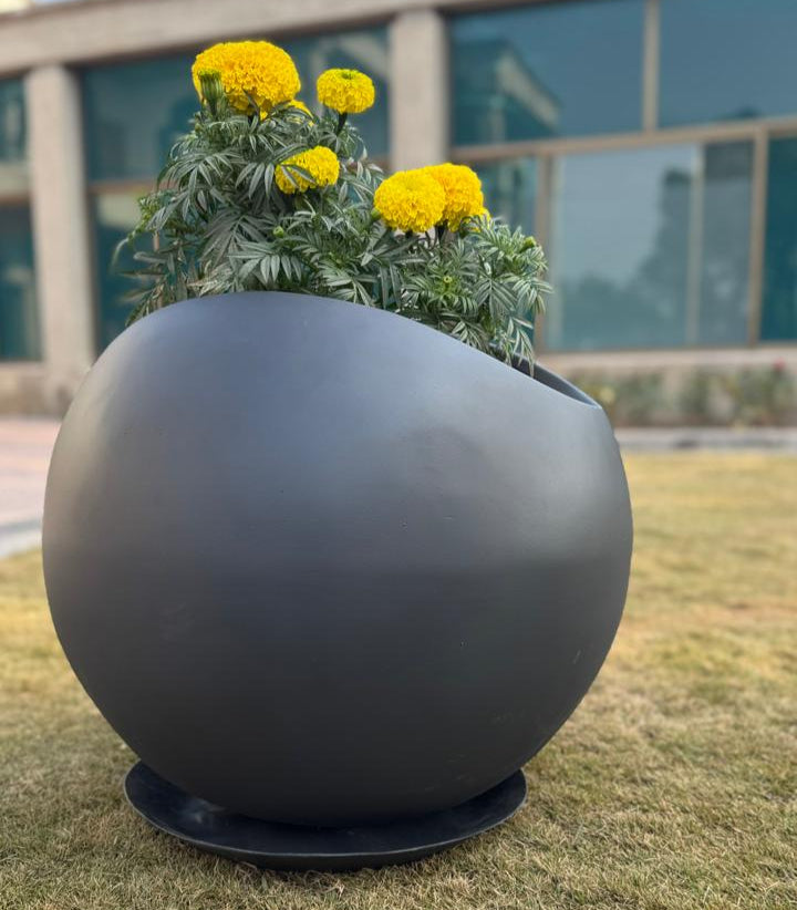 Modern grey matte fiberglass pot with drainage holes, 57 cm height, 51 cm length, and 45.5 cm diameter, ideal for indoor and outdoor use.