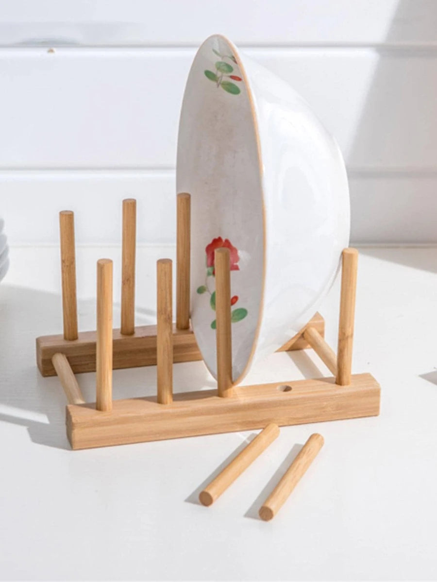 Multifunctional wooden dish rack with multiple slots for drying cups, plates, and pan lids. Made of durable food-grade wood and bamboo, featuring a compact design for easy storage and use. Dimensions: 14x12x11.5 cm