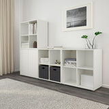 A compact white cabinet with four spacious compartments, measuring 27 1/2x13 3/4x27 1/2 inches. Ideal for organizing books, decor, or household items, its sleek, modern design suits any room, offering both style and practicality.