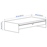 A white monitor stand with a drawer, measuring 10x47x26 cm. Made of durable bamboo with a white aluminum frame, it features compartments for organizing office supplies and a space to store a keyboard. The ergonomic design helps reduce neck and shoulder strain while providing cable management for a tidy workspace.